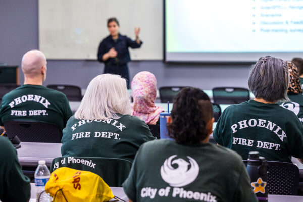 20240918 - SolarSPELL training PFD - Phoenix

The image is fully released; the model release is on file in Media Relations & Strategic Communications.

ASU Assistant Professor Heather Ross, co-director of SolarSPELL Health, leads one of two SolarSPELL training sessions with Phoenix Fire Department’s Community Assistance Program members on Wednesday, September 18, 2024, at the department’s special operations in south Phoenix. The nearly 20 employees learned how to help victims of emergencies and how to download curated content to their smartphones, tablets or computers. The remodeled crisis response library is colorful, illustrated and rewritten in English or Spanish to a fifth-grade level. The victims can also download content from the ASU SolarSPELL unit for children, including art, games and movies, to distract them from the emergency. Research studies show distraction greatly aids youngsters in traumatic situations. Photo by Charlie Leight/ASU News